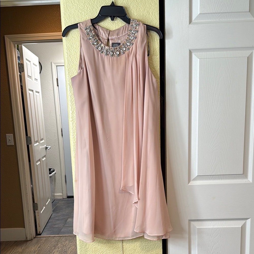 Elegant Pink Sleeveless Dress with Embellished Neckline